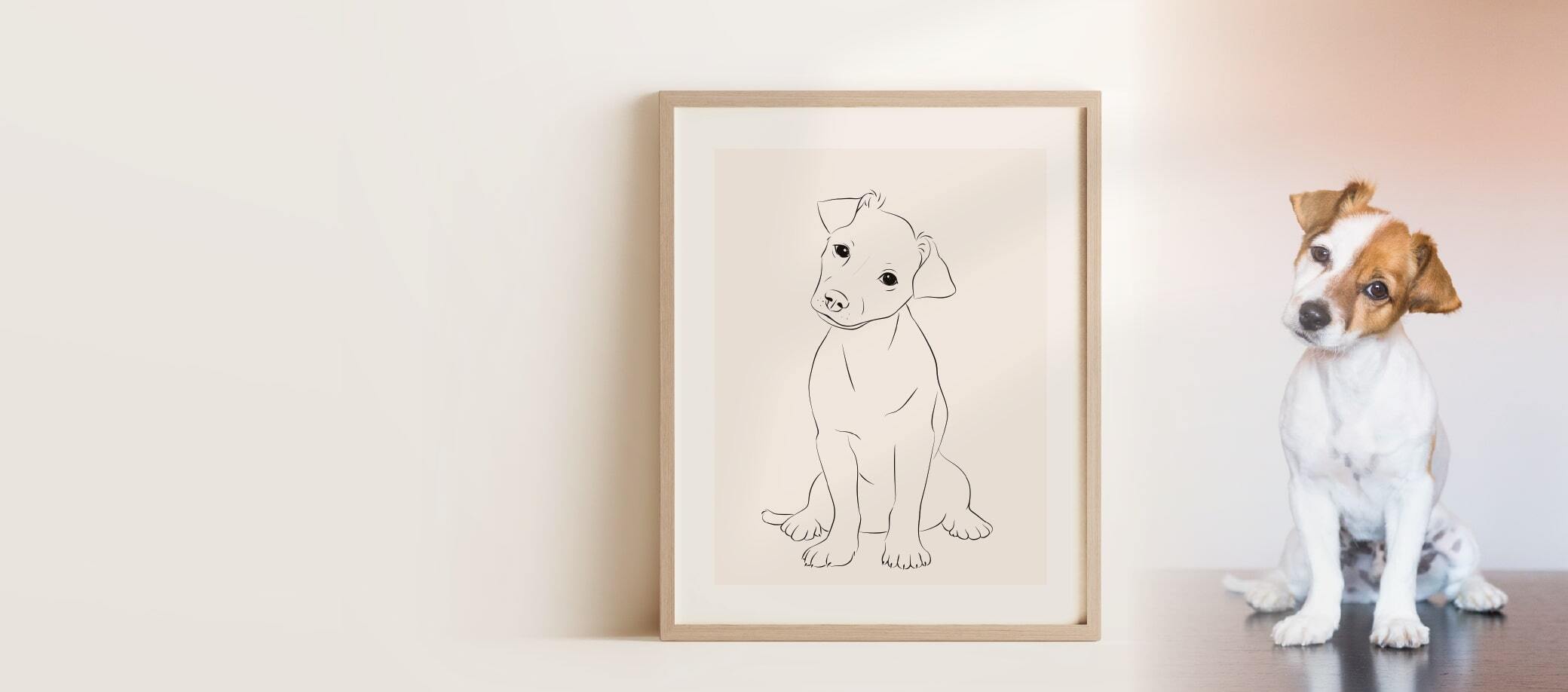 A Miroar Line Art image of a young Jack Russell in an oak wood frame, placed next to the drawing